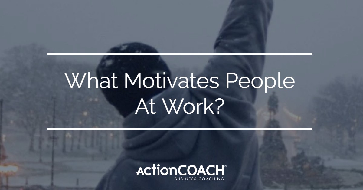Image of a back of a person punching the air with an overlay of What Motivates People At Work