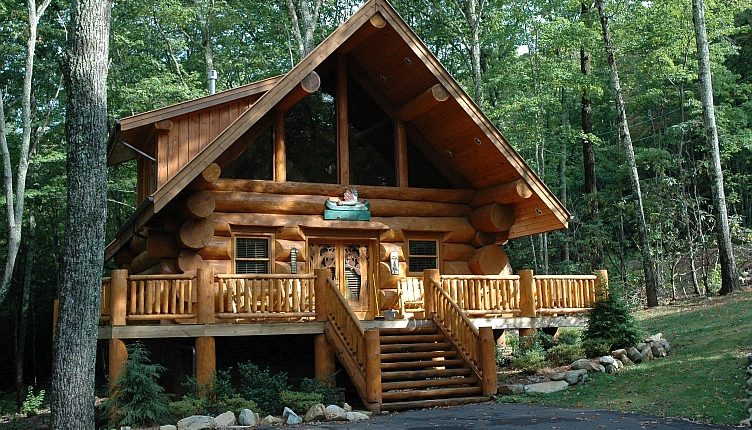 Photograph of Bill Gate's beautiful log cabin, surrounded by forest, ideal for unplugging from work